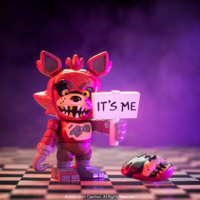 Foxy from Five Nights at Freddy's appears as a Funko SNAPS! figure, holding a sign that says "IT'S ME"